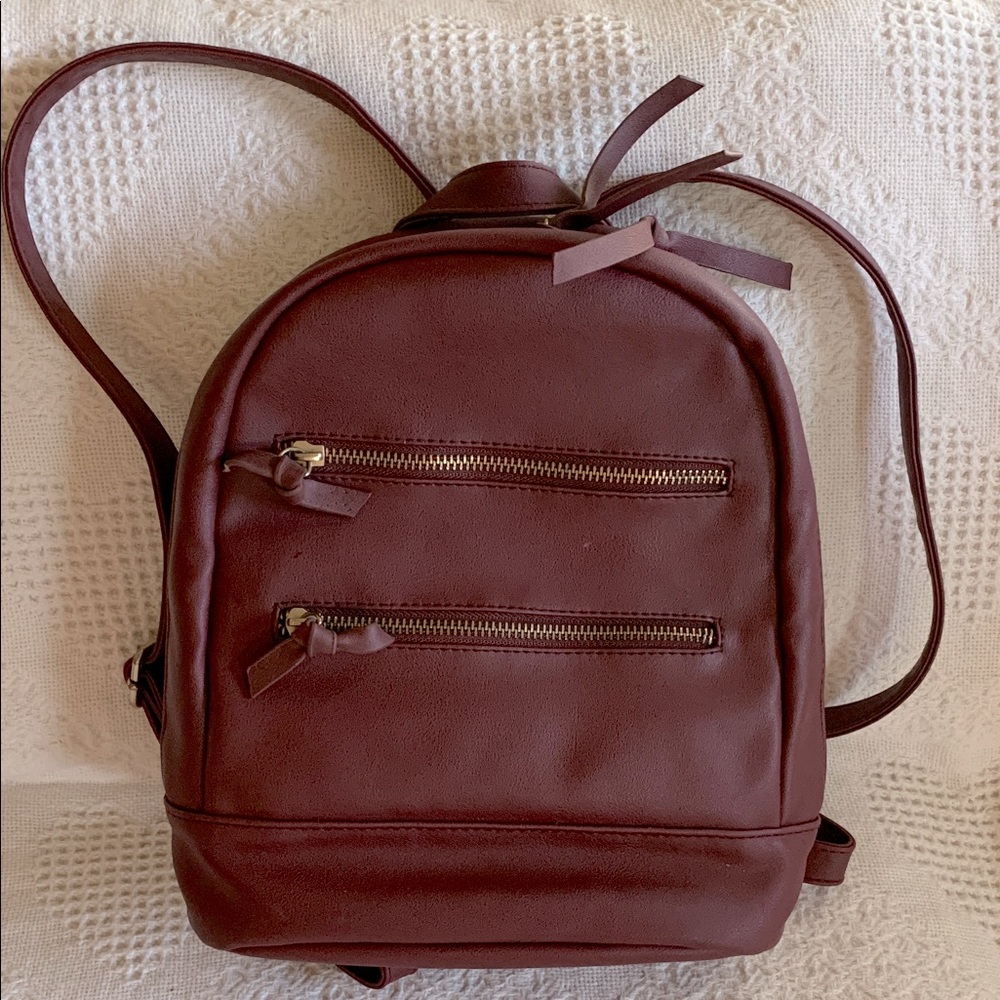 Backpack purse burgundy/maroon color with adjustable straps